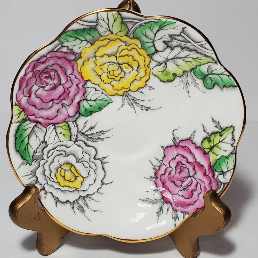 Rosina Teacup and Saucer Floral Pink Yellow White Vintage